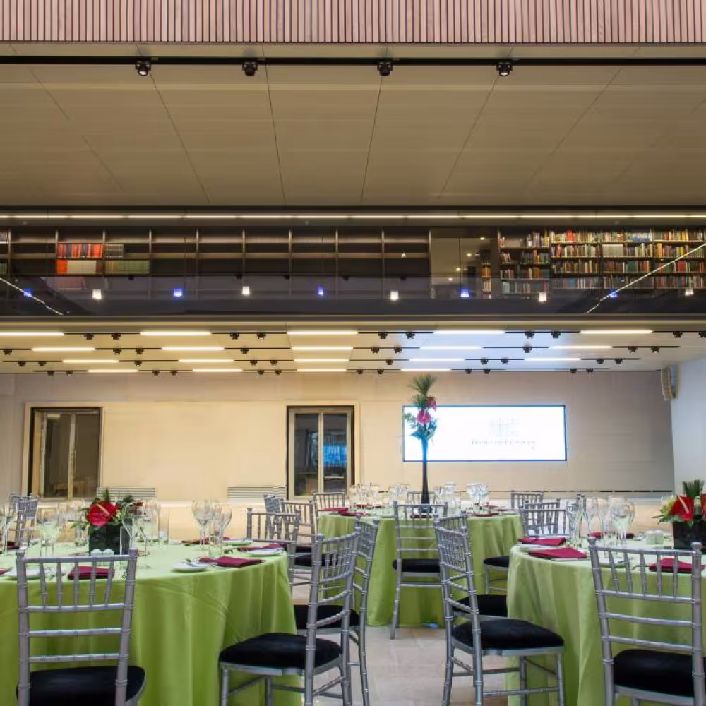 Inside an Oxofrd venue with tables laid out